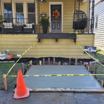 Fresh concrete porch pour with brushed finish