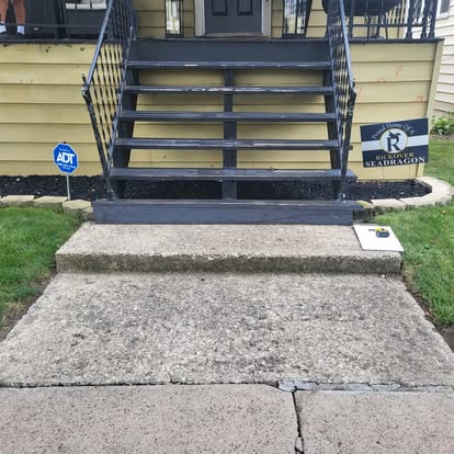 Before: damaged concrete sidewalk needing replacement